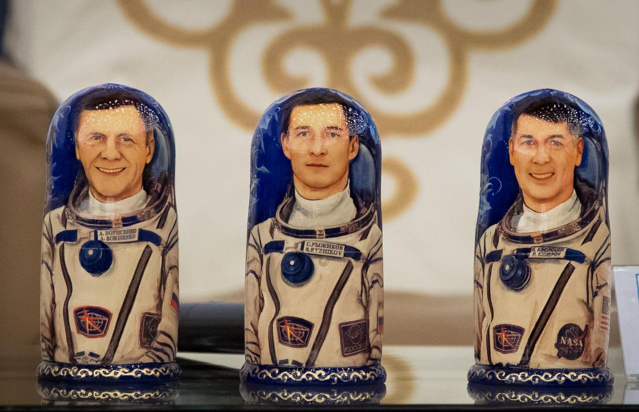 nhq201704100052 (April 10, 2017) --- Matryoshka Dolls depicting Expedition 50 Flight Engineers Andrey Borisenko and Sergey Ryzhikov of Roscosmos, and NASA astronaut Shane Kimbrough are seen at a welcome ceremony, Monday, April 10, 2017 at the Karaganda Airport in Kazakhstan. Kimbrough, Ryzhikov, and Borisenko are returning after 173 days in space where they served as members of the Expedition 49 and 50 crews onboard the International Space Station. Photo Credit: (NASA/Bill Ingalls)