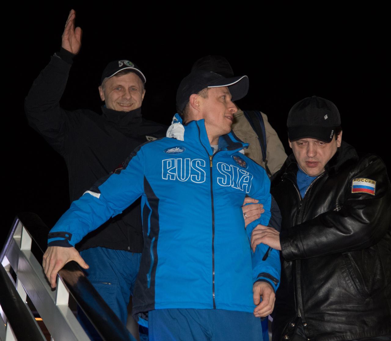 nhq201704110056 (April 101, 2017) --- Officials, family, and media gather to welcome home Expedition 50 Flight Engineers Sergey Ryzhikov, foreground, and Andrey Borisenko of Roscosmos at the Chkalovsky Airport in Star City, Russia several hours after they and NASA astronaut Shane Kimbrough landed their Soyuz MS-02 spacecraft in a remote area outside the town of Zhezkazgan, Kazakhstan, on Tuesday, April 11, 2017 (Kazakh time). Kimbrough, Ryzhikov, and Borisenko are returning after 173 days in space where they served as members of the Expedition 49 and 50 crews onboard the International Space Station. Photo Credit: (NASA/Bill Ingalls)