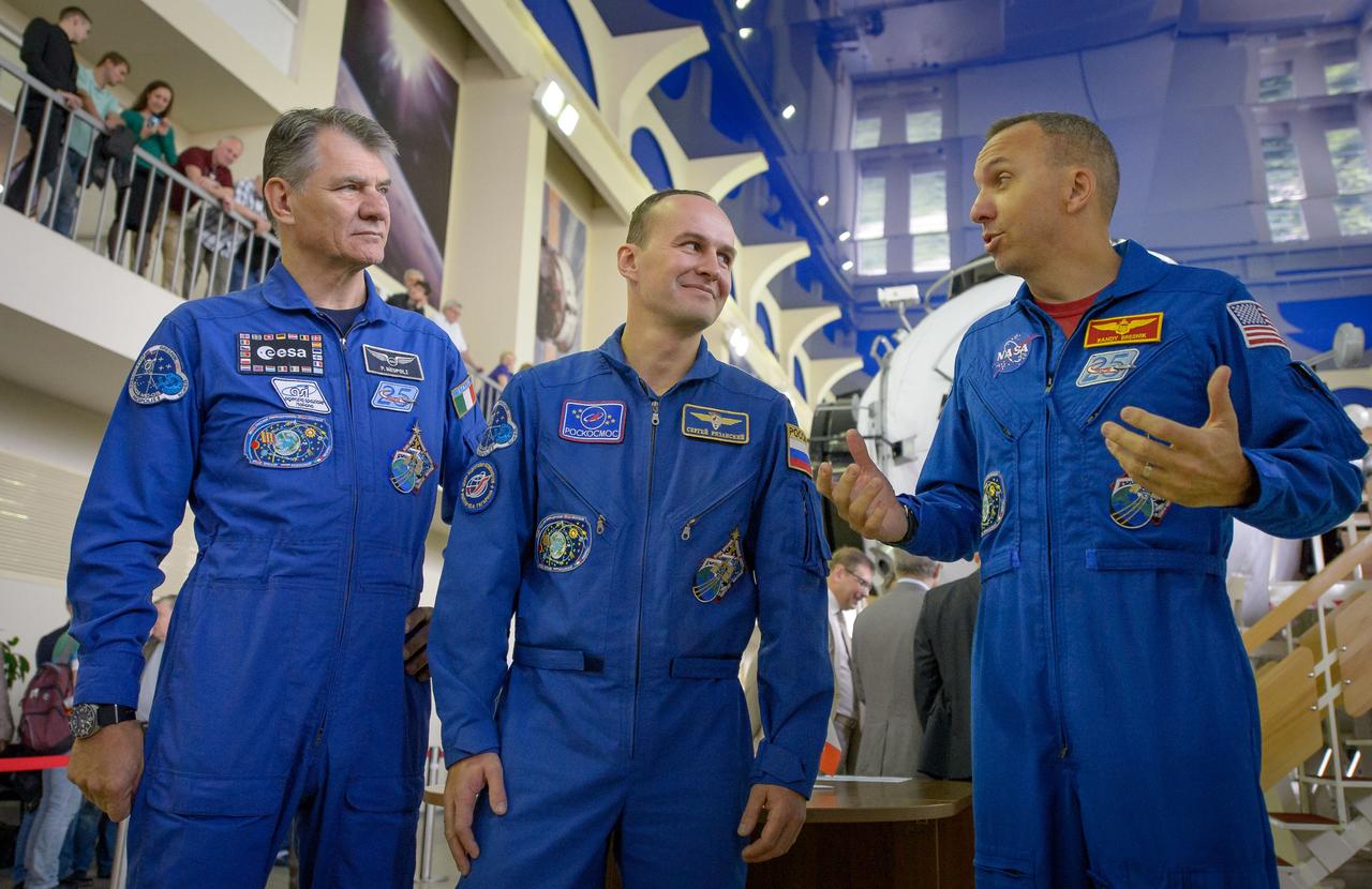 nhq2017070600106 (July 6, 2017) --- Expedition 52 flight engineers Paolo Nespoli of ESA, left, Sergey Ryazanskiy of Roscosmos, center, and Randy Bresnik of NASA are seen as they start their second to last day of qualification exams, Thursday, July 6, 2017 at the Gagarin Cosmonaut Training Center (GCTC) in Star City, Russia. Photo Credit: (NASA/Bill Ingalls)