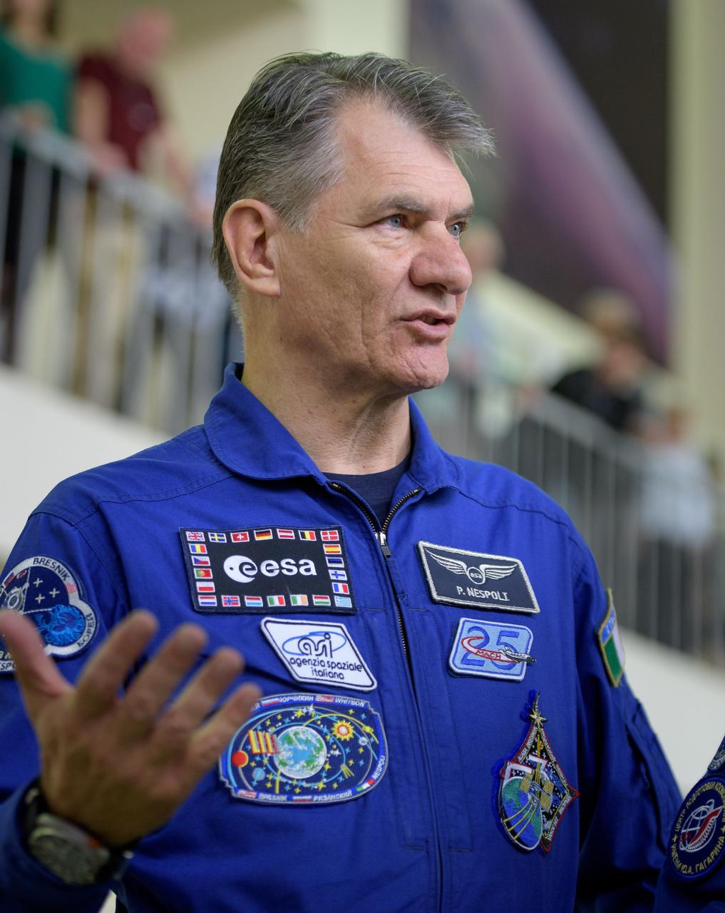 nhq2017070600109 (July 6, 2017) --- Expedition 52 flight engineer Paolo Nespoli of ESA answers questions from the media as he and \Randy Bresnik of NASA, and Sergey Ryazanskiy of Roscosmos start their second to last day of qualification exams, Thursday, July 6, 2017 at the Gagarin Cosmonaut Training Center (GCTC) in Star City, Russia. Photo Credit: (NASA/Bill Ingalls)