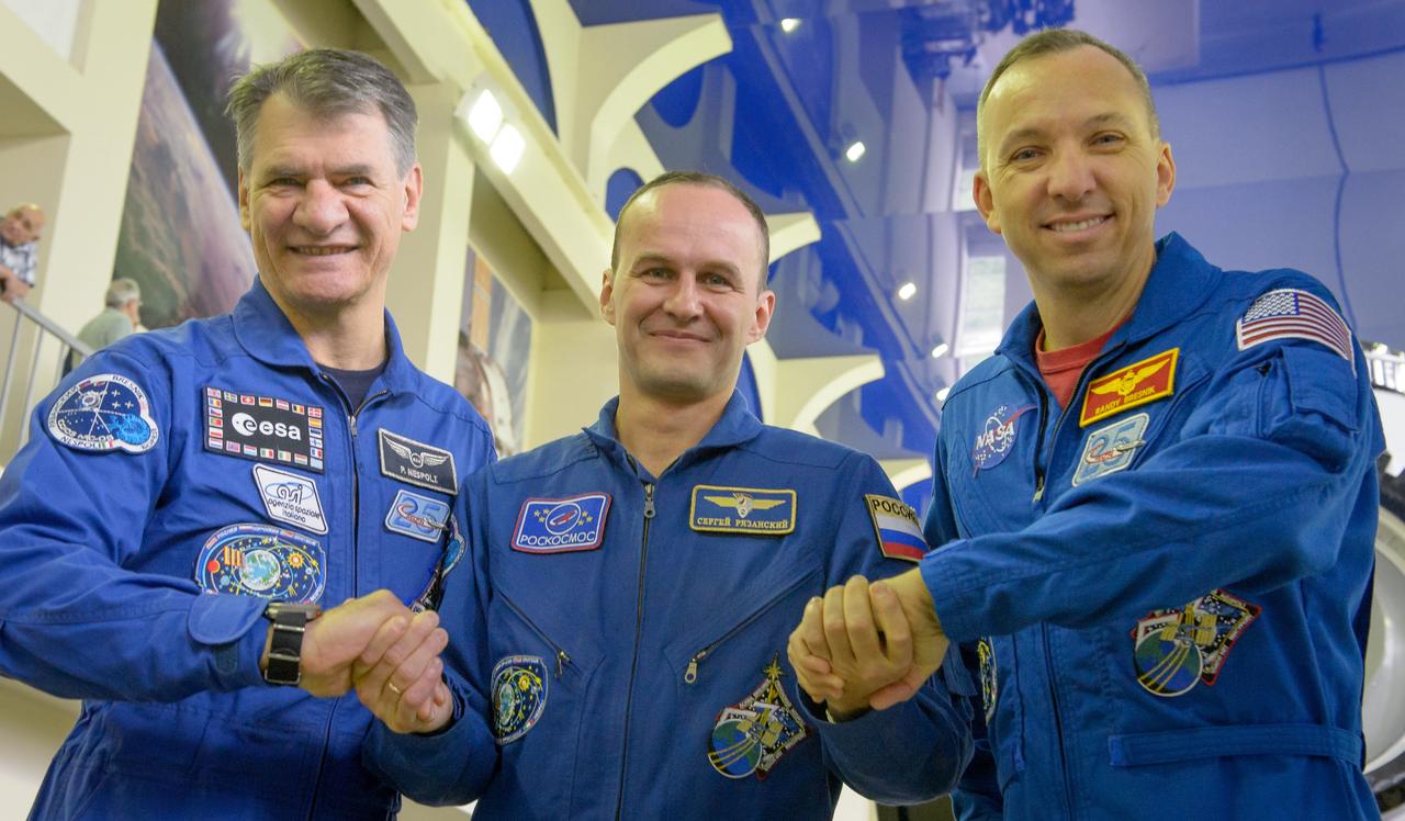 nhq2017070600112 (July 6, 2017) --- Expedition 52 flight engineers Paolo Nespoli of ESA, left, Sergey Ryazanskiy of Roscosmos, center, and Randy Bresnik of NASA are seen as they start their second to last day of qualification exams, Thursday, July 6, 2017 at the Gagarin Cosmonaut Training Center (GCTC) in Star City, Russia. Photo Credit: (NASA/Bill Ingalls)
