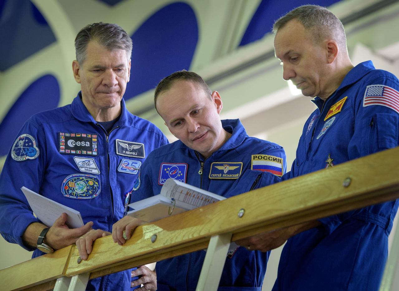 nhq2017070600114 (July 6, 2017) --- Expedition 52 flight engineers Paolo Nespoli of ESA, left, Sergey Ryazanskiy of Roscosmos, center, and Randy Bresnik of NASA are seen as they start their second to last day of qualification exams, Thursday, July 6, 2017 at the Gagarin Cosmonaut Training Center (GCTC) in Star City, Russia. Photo Credit: (NASA/Bill Ingalls)