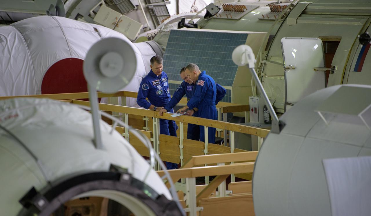 nhq2017070600115 (July 6, 2017) --- Expedition 52 flight engineers Paolo Nespoli of ESA, left, Sergey Ryazanskiy of Roscosmos, center, and Randy Bresnik of NASA are seen as they start their second to last day of qualification exams, Thursday, July 6, 2017 at the Gagarin Cosmonaut Training Center (GCTC) in Star City, Russia. Photo Credit: (NASA/Bill Ingalls)