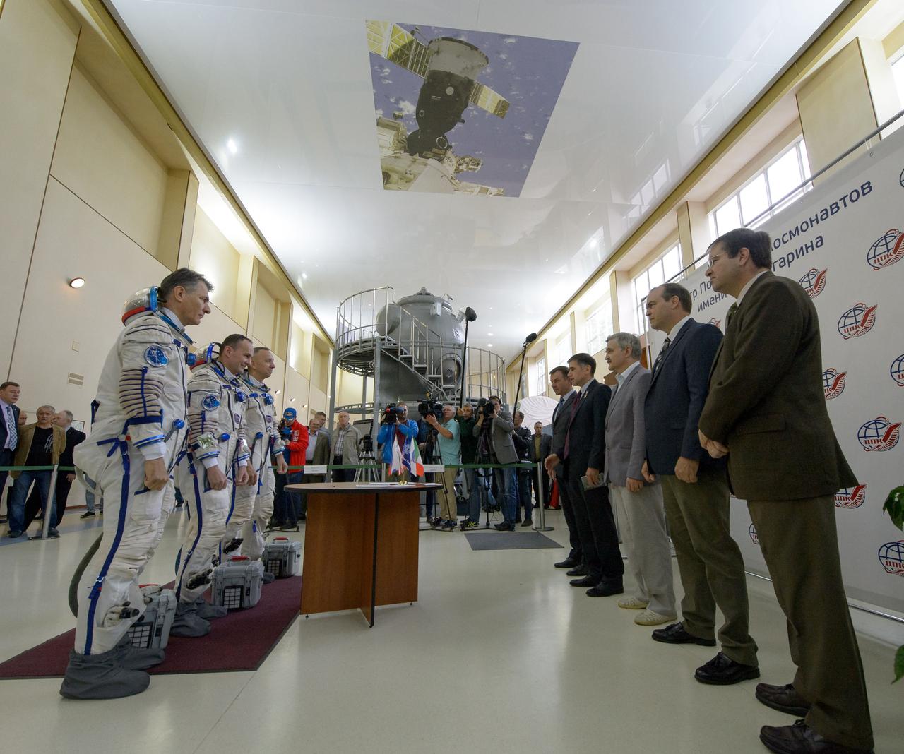 nhq201707070004 (July 7, 2017) --- Expedition 52 flight engineers Paolo Nespoli of ESA, left, Sergey Ryazanskiy of Roscosmos, center, and Randy Bresnik of NASA meet with, Cosmonaut Yuri Gidzenko, left, Cosmonaut Yuri Malenchenko, Deputy Director, GCTC, Cosmonaut Alexander Kaleri, John McBrine, NASA Director of Operations, GCTC and Mark Bowman, NASA Soyuz Technical Lead ahead of the crew's final Soyuz qualification exam, Friday, July 7, 2017 at the Gagarin Cosmonaut Training Center (GCTC) in Star City, Russia. Photo Credit: (NASA/Bill Ingalls)