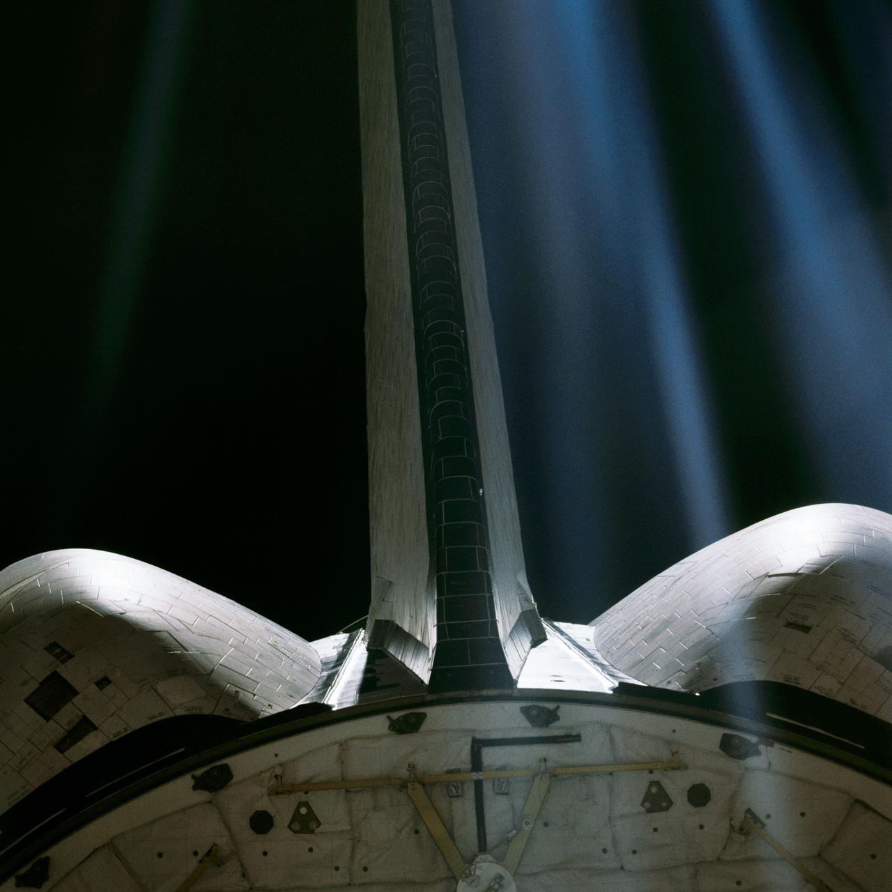 Views of the aft end of the space shuttle Columbia during the STS-1 mission include view of shuttle stabilizer.