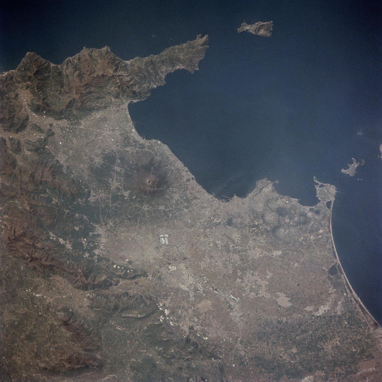 STS001-13-442 (14 April 1981) --- This photograph showing much of Italy was taken with a handheld 70mm camera from 276 kilometers above Earth as the NASA space shuttle Columbia and its crew were marking their last few hours in space on the historic first space mission utilizing a reusable vehicle. Included in the area of the frame are Golfo de Napoli, Napoli (Naples), Castellammare, Amalfi, Capri, Sorrento, Mt. Vesuvius and the ruins of Pompei. Astronauts John W. Young and Robert L. Crippen exposed eight magazines of color 70mm film during their two and one-third days in Earth orbit. Photo credit: NASA