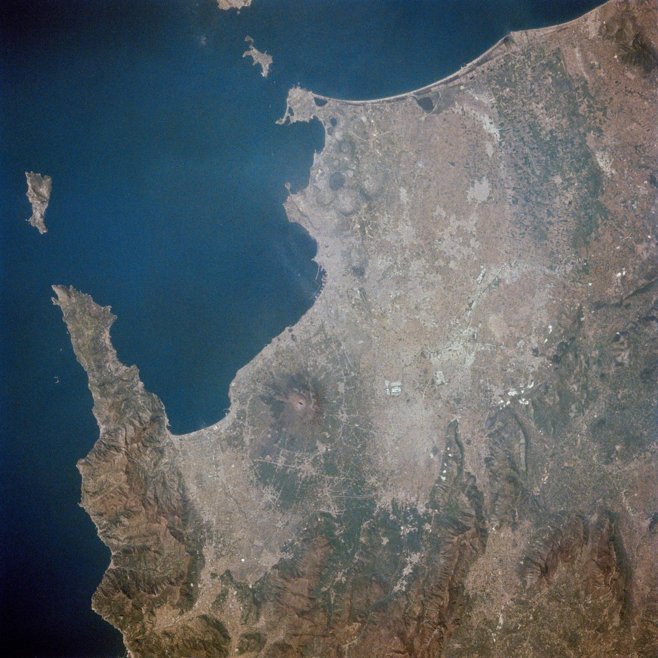 STS001-13-443 (12-14 April 1981) --- This photograph showing much of Italy was taken with a hand-held 70mm camera from 276 kilometers above Earth as the NASA space shuttle Columbia and its crew were marking their last few hours in space on the historic first space mission utilizing a reusable vehicle. Included in the area of the frame are Golfo de Napoli, Napoli (Naples), Castellammare, Amalfi, Capri, Sorrento, Mt. Vesuvius and the ruins of Pompei. Astronauts John W. Young and Robert L. Crippen exposed eight magazines of color 70mm film during their two-and-one-third days in Earth orbit. Photo credit: NASA