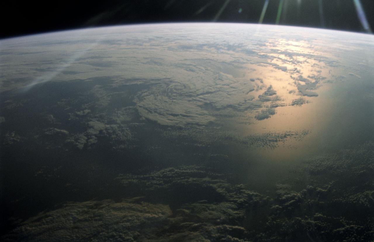 STS005-14-514 (11-16 Nov. 1982) --- This 35mm frame, taken against sunglint, shows clouds over the Pacific Ocean. A Nikon F-3 35mm modified camera and Type 5017, medium speed Ektachrome film were used to record the frame. Approximately 20 frames of 35mm and several dozen frames of 70mm photography of Earth were exposed on the week-long mission aboard the space shuttle Columbia (STS-5). Photo credit: NASA