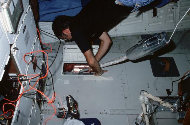 NASA image: Commander Truly cleans ARS filters on middeck