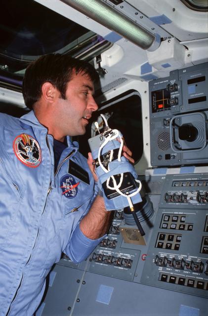 NASA image: Pilot Brandenstein performs various procedures on flight deck