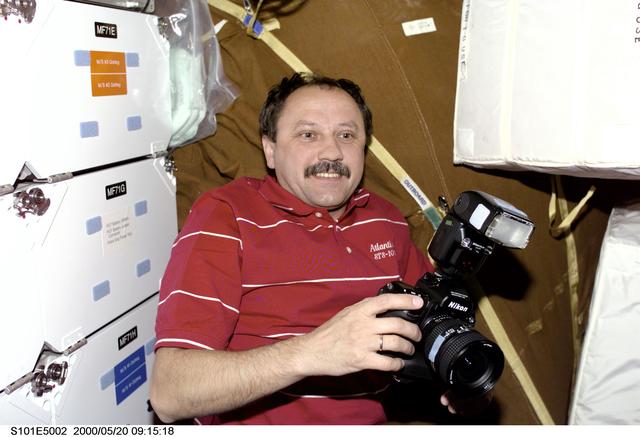 NASA image: MS Usachev with camera on middeck