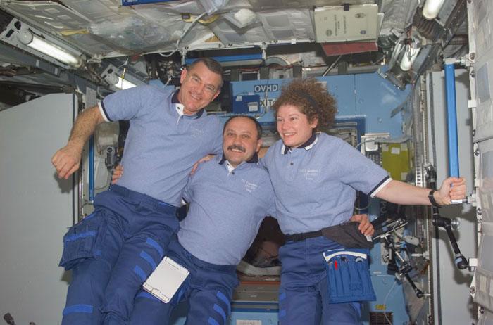 STS102-E-5096  (10 March 2001)  --- Astronaut James S. Voss, cosmonaut Yury V. Usachev and astronaut Susan J. Helms--the Expedition Two crew members--pose for a photo on the International Space Station (ISS).  Voss and Helms are assigned to space walk duties after the Space Shuttle Discovery and the International Space Station (ISS) link in Earth orbit.  The photograph was recorded with a digital still camera.