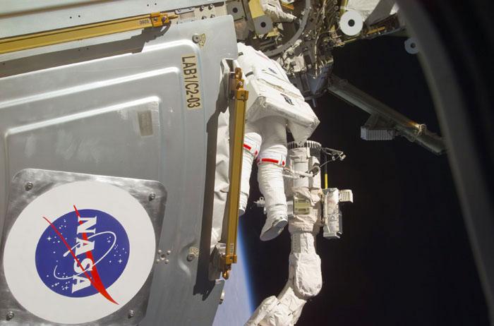 STS102-E-5180 (13 March 2001) --- Astronaut Andrew S.W. Thomas, mission specialist, near the Destiny laboratory during the second STS-102 space walk.  The photograph was taken with a digital still camera.