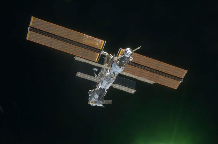 STS102-E-5350 (18 March 2001) --- The International Space Station (ISS) backdropped against black space was photographed with a digital still camera from the Space Shuttle Discovery on March 18, 2001.  It is a standard practice for the shuttle to make a final fly-around of the outpost following unlinking from it. A new crew comprised of cosmonaut Yury V. Usachev and astronauts James S. Voss and Susan J. Helms will spend several months aboard the station.