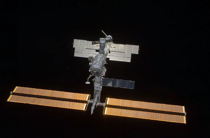 STS102-E-5379 (18 March 2001) --- The International Space Station (ISS) backdropped against black space was photographed with a digital still camera from the Space Shuttle Discovery on March 18, 2001.  It is a standard practice for the shuttle to make a final fly-around of the outpost following unlinking from it. A new crew comprised of cosmonaut Yury V. Usachev and astronauts James S. Voss and Susan J. Helms will spend several months aboard the station.