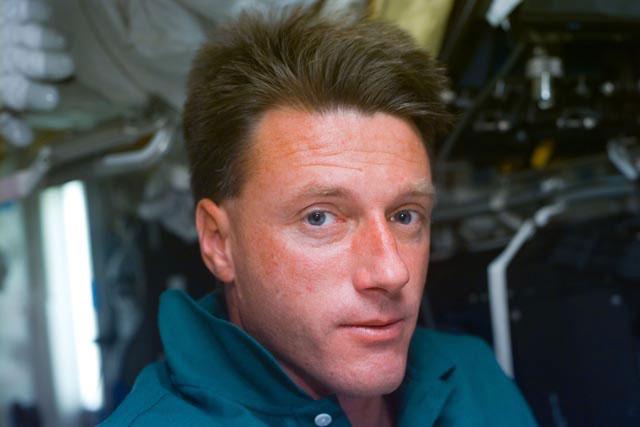 S103-E-5001 (20 December 1999) --- Astronaut C. Michael Foale, making his first mission into space since spending several months aboard the Russian Space Agency's (RSA) Mir space station, is pictured on Discovery's aft flight deck near the end of STS-103's first full day in space.  The photo was taken with an electronic still camera (ESC)  at 16:09:27 GMT, Dec. 20, 1999.