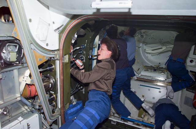 NASA image: MS Kavandi installs cables in Quest airlock