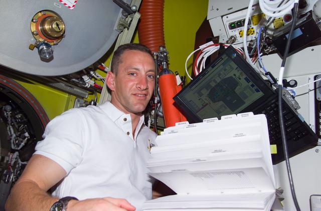 NASA image: PLT Hobaugh in Quest airlock