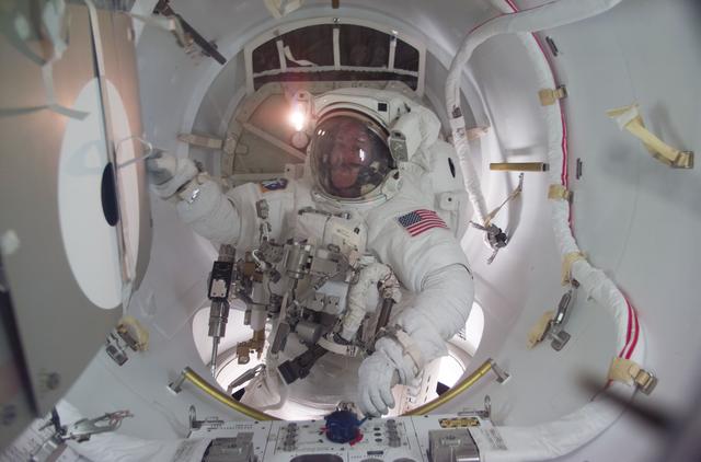 NASA image: MS Reilly in airlock at the end of the third EVA