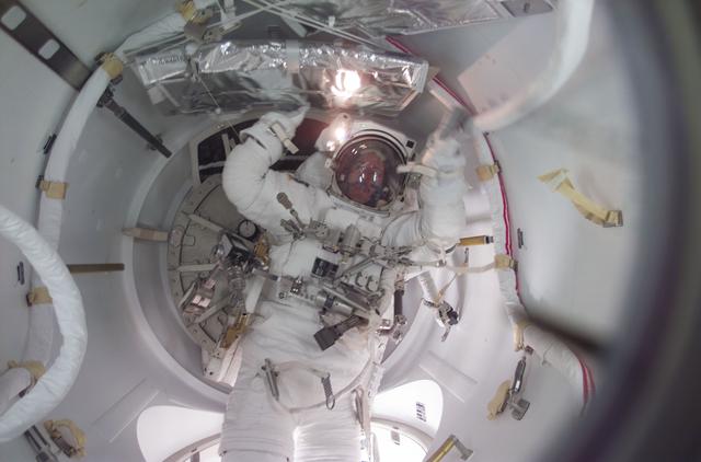 NASA image: MS Reilly in airlock at the end of the third EVA