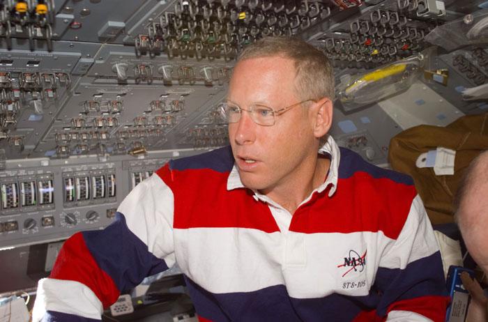STS105-E-5021 (11 August 2001) --- Astronaut Patrick G. Forrester, mission specialist, is pictured on Discovery's flight deck as he experiences his first day in space.  Forrester is an alumnus of the 1996 class of astronaut candidates.  The image was recorded with a digital still camera.