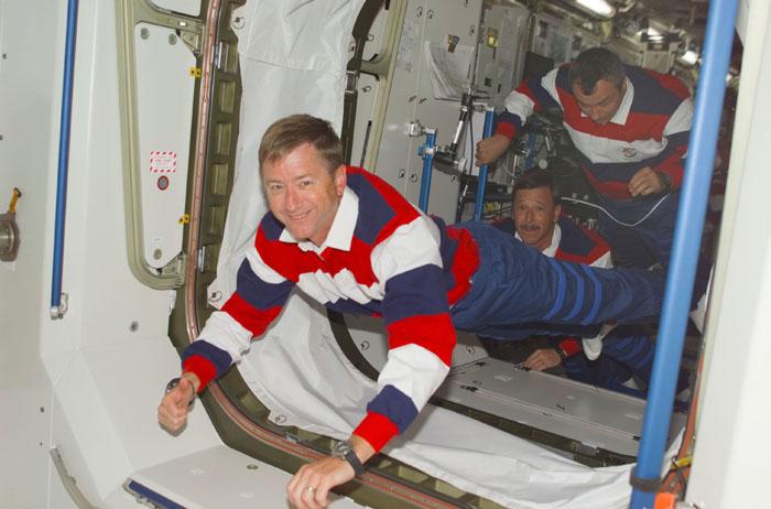 STS105-E-5108 (12 August 2001) --- Frank L. Culbertson, Jr., Expedition Three mission commander, leads cosmonaut Vladimir N. Dezhurov (back top), Expedition Three flight engineer, and Scott J. Horowitz, STS-105 commander, into Unity Node 1 during the initial ingress into the International Space Station (ISS) during the STS-105 mission.  Culbertson and Dezhurov, accompanied by cosmonaut Mikhail Tyurin, will be replacing astronauts Susan J. Helms and James S. Voss and cosmonaut Yury V. Usachev as the temporary residents of the ISS.  This image was taken with a digital still camera.