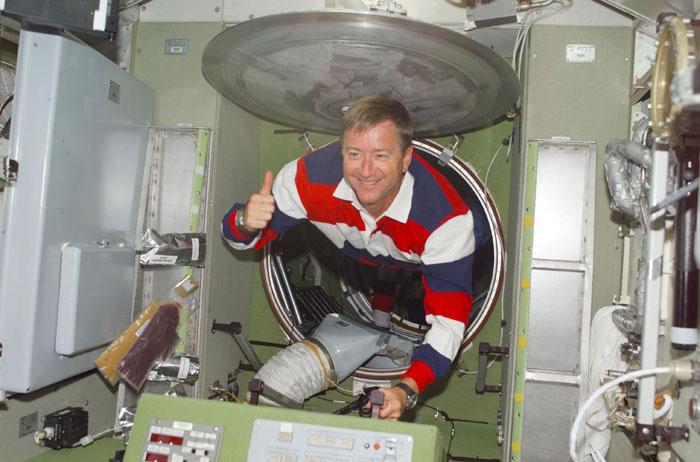 STS-105-E-5118 (12 August 2001) --- Frank L. Culbertson, Expedition Three mission commander, gives a thumbs up as he enters the Zvezda Service Module during the initial ingress into the International Space Station (ISS) for the STS-105 mission.  Culbertson, accompanied by cosmonauts Vladimir N. Dezhurov and Mikhail Tyurin, will be replacing astronauts Susan J. Helms and James S. Voss and cosmonaut Yury V. Usachev as the temporary residents on the ISS.  This image was taken with a digital still camera.