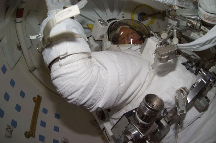 STS105-E-5222 (16 August 2001) --- Astronaut Patrick G. Forrester is just about ready to egress the airlock  onboard the Space Shuttle Discovery to  begin a lengthy space walk to perform work on the International Space Station (ISS).  The image was recorded with a digital still camera.