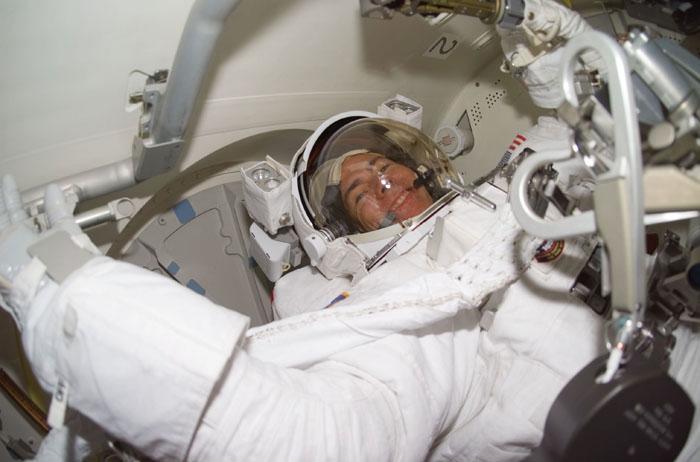 STS105-E-5224 (16 August 2001) --- Astronaut Daniel T. Barry is just about ready to egress the airlock  onboard the Space Shuttle Discovery to begin a lengthy space walk to perform work on the International Space Station (ISS).  The image was recorded with a digital still camera.