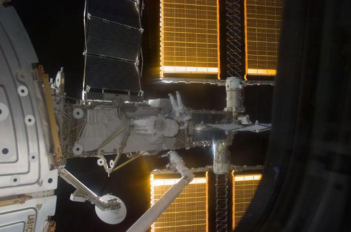 STS105-E-5292 (16 August 2001) --- Astronaut Patrick G. Forrester works with the Early Ammonia Servicer (EAS), which he and fellow spacewalker Daniel T. Barry (out of frame) are in the process of installing on a segment of the P6 structure on the International Space Station (ISS). The two mission specialists were participating in the first of two scheduled STS-105 space walks. During the space walk, Discovery's commander Scott J. Horowitz operated the shuttle robot arm, and pilot Frederick W. (Rick) Sturckow choreographed the space walk from the orbiter's flight deck. The image was recorded with a digital still camera.