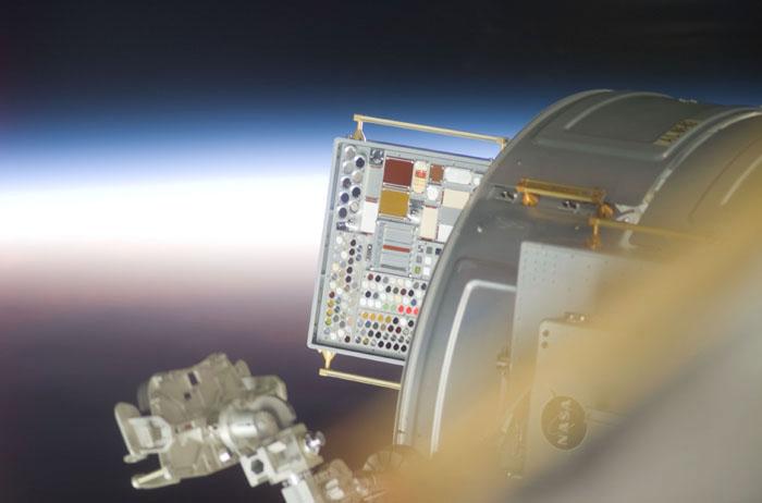 STS105-E-5342 (17 August 2001) --- Backdropped by a sunrise, the newly installed Materials International Space Station Experiment (MISSE) is visible. The MISSE was installed on the outside of the Quest Airlock during the first extravehicular activity (EVA) of the STS-105 mission. MISSE will collect information on how different materials weather in the environment of space. This image was taken with a digital still camera.