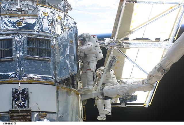 NASA image: STS-109 MS Grunsfeld and Linnehan on third EVA