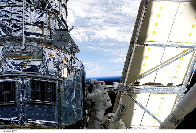 NASA image: STS-109 MS Grnsfeld and Linnehan on third EVA