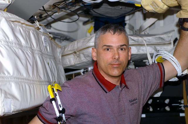 NASA image: MS Morin poses on the middeck of Atlantis during STS-110