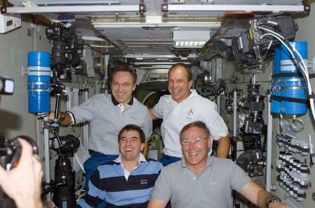 NASA image: Walz, Bloomfield, Walheim and Ross pose in Zvezda during STS-110's visit to the ISS
