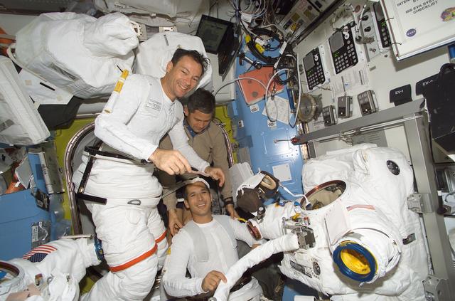 NASA image: Lockhart, Herrington, and Lopez-Alegria in Quest during STS-114 EVA PREP