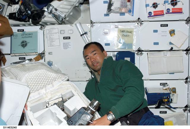NASA image: STS-114 Mission specialist Noguchi on middeck