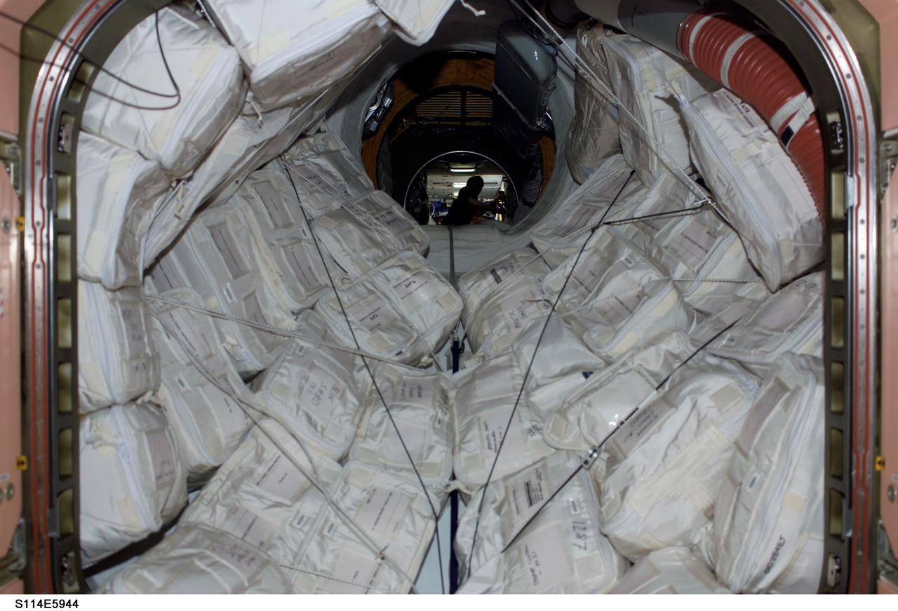S114-E-5944 (31 July 2005) --- An airlock serves as temporary storage area for supplies being transferred to the International Space Station from the Space Shuttle Discovery.