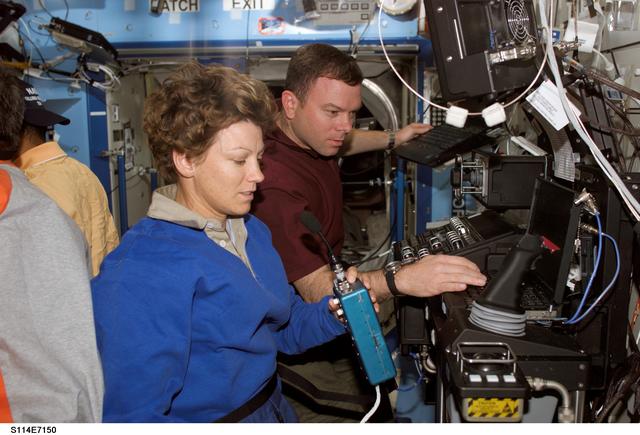 NASA image: Collins and Kelly  in U.S. Laboratory