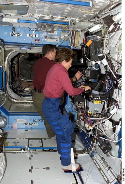 NASA image: Lawrence and Kelly at SSRMS controls in Destiny laboratory module