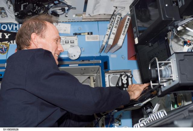 NASA image: MacLean works at the Robotic Arm in the U.S. Laboratory during STS-115 EVA
