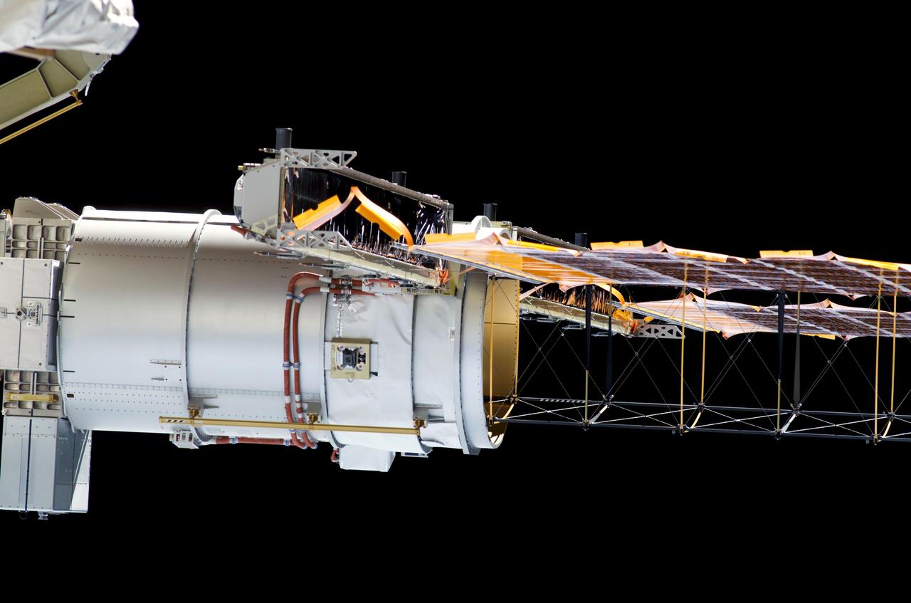 S115-E-06186 (14 Sept. 2006) --- Space Shuttle Atlantis astronauts spread a second set of wings for the International Space Station today. The new solar arrays were fully extended at 7:44 a.m. (CDT). The new arrays span a total of 240 feet and have a width of 38 feet. They are attached to the station's newest component, the P3/P4 integrated truss segment. The installation of the P3/P4, which occurred Sept. 12 and the deployment of the arrays set the stage for future expansion of the station.