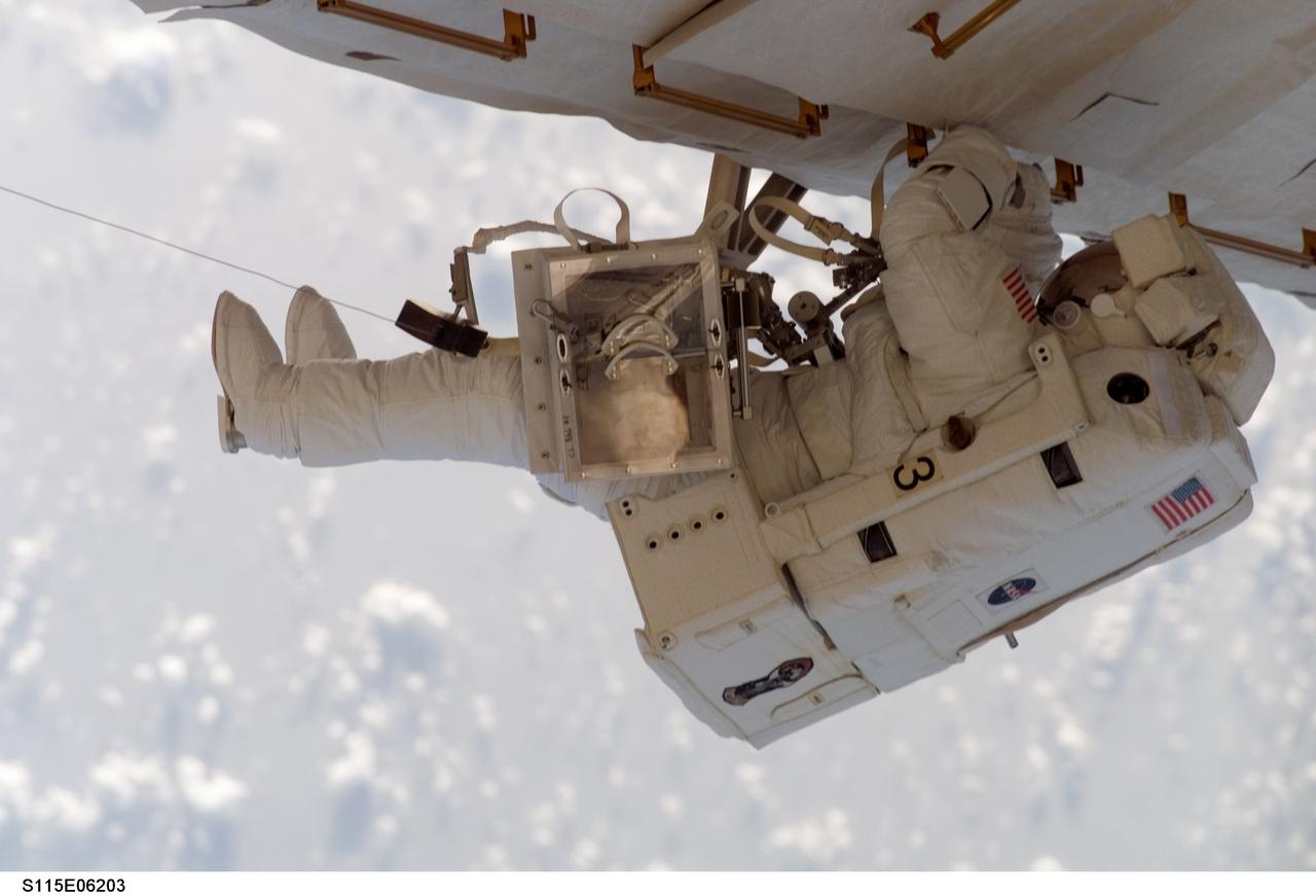 S115-E-06203 (15 Sept. 2006) --- Astronaut Heidemarie M. Stefanyshyn-Piper, STS-115 mission specialist, participates in her second spacewalk this week and the second one of career as extravehicular work wraps up for the Atlantis crewmembers and their colleagues aboard the International Space Station. The STS-115 and Expedition 13 crewmembers  shared various tasks for three space walks this week, marking the  resumption of construction on the orbital outpost.
