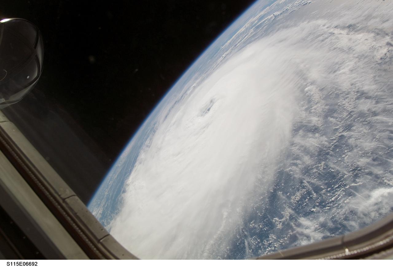 S115-E-06692 (17 Sept. 2006) --- Hurricane Helene was captured at 18:20:14 GMT, Sept. 17, 2006 with a digital still camera, equipped with a 20-35mm lens, by one of the crewmembers aboard the Space Shuttle Atlantis. The center of the storm was located near 20.9 degrees north latitude and 49.0 degrees west longitude, while moving northwest. At the time the photo was taken, the sustained winds were 90 nautical miles per hour with gusts to 110 nautical miles per hour.