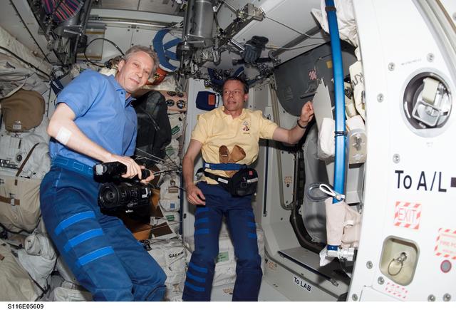 NASA image: Crewmembers Reiter and Fuglesang in the U.S. Laboratory during Joint Operations