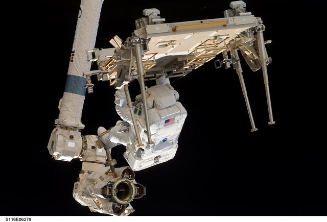 NASA image: STS-116 MS Fuglesang relocates CETA 2 cart on EVA 2