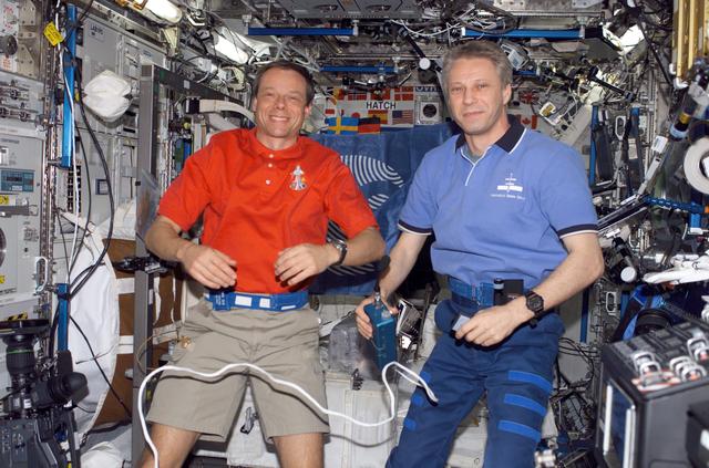 NASA image: STS-116 MS Fuglesang and STS-116 FE Reiter conduct PAO Event in the U.S. Laboratory