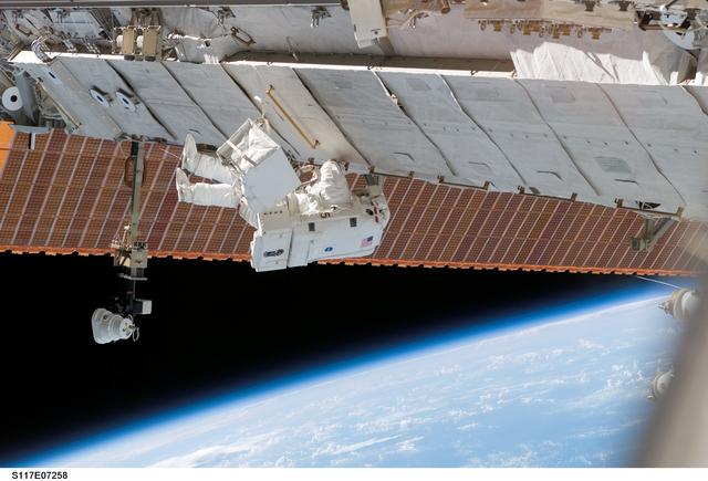 NASA image: Forrester moves to the S3/S4 Truss during STS-117 EVA 2