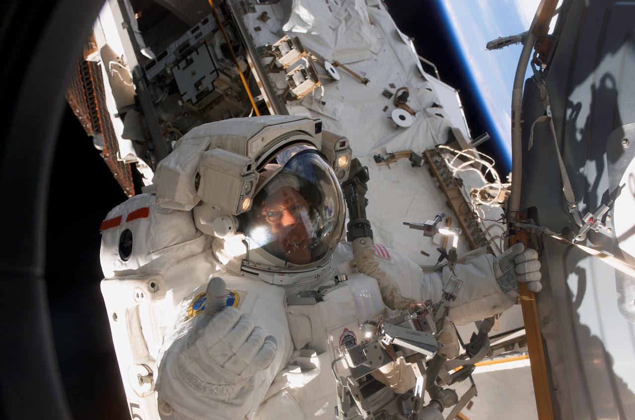 S117-E-07829 (17 June 2007) --- Astronaut Patrick Forrester, STS-117 mission specialist, participates in the mission's fourth and final session of extravehicular activity (EVA), as construction continues on the International Space Station. Among other tasks, Forrester and astronaut Steven Swanson (out of frame), mission specialist, continued activation of the station's new starboard 3 and 4 (S3/S4) truss segment; checked out the Drive Lock Assembly 2, one of two mechanisms that will drive rotation of the S3/S4 Truss Solar Alpha Rotary Joint (SARJ); and removed the final launch restraints on the SARJ.