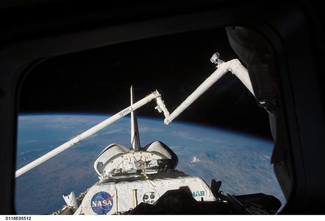 NASA image: View of the Payload Bay, Vertical Stabilizer, and RMS/OBSS taken during STS-118